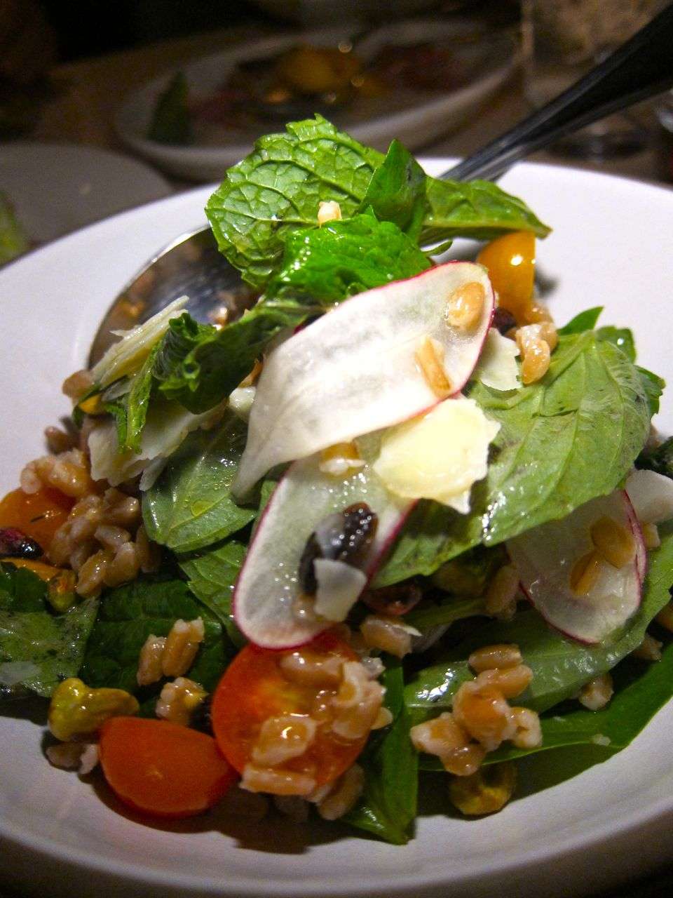 We could make a dinner of small plates, starting with this marvelous farro salad.